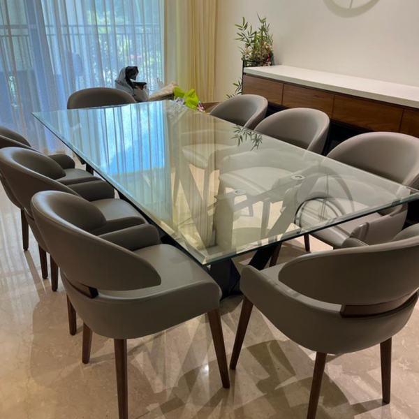 Skorpio Dining Table Set with Glass Top and PU Leather Chairs on Wooden Legs.